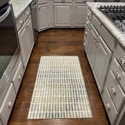 Modern kitchen with wooden cabinets, granite countertops, and stainless steel appliances.