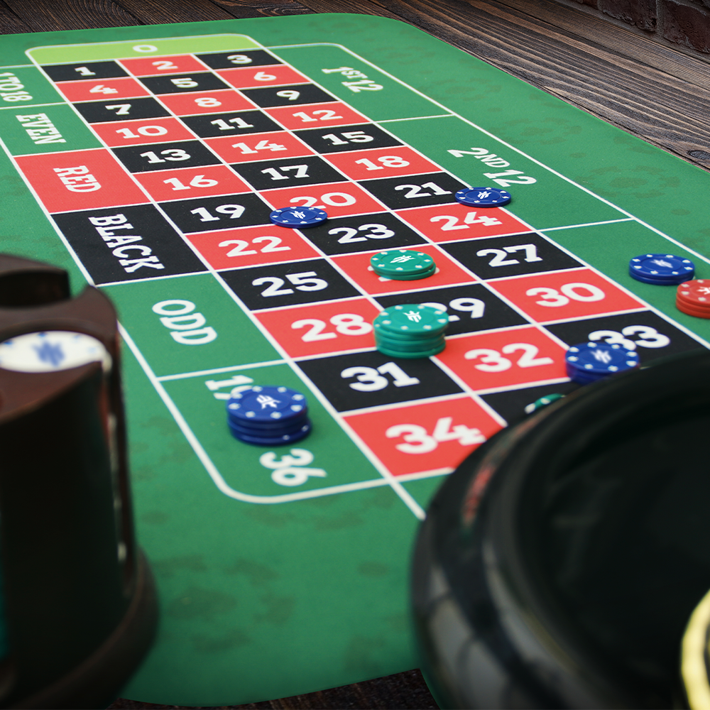 Roulette in use Matsmiths Roulette Pro Table Topper Mat, Washable Casino-Style Gaming Mat with Smooth Felt Surface and Rubber Backing, Non-Slip Poker Table Cover for Kitchen Tables, Game Tables, Pub Tables, Stain-Resistant, Green with Betting Zone Design, 24” x 47”
